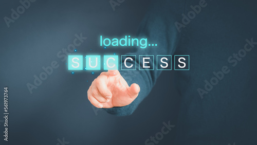 Adult man touching virtual screen loading bar with success text. Concept of goal, action plan, strategy and new year business vision. New start up business.