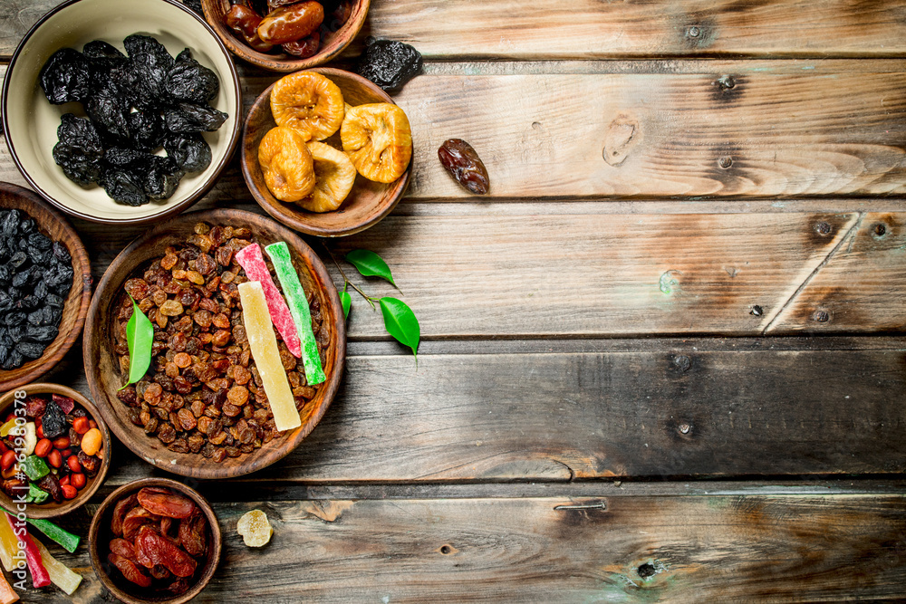 Assortment of different dried fruits in bowls. Assortment of different dried fruits in bowls.