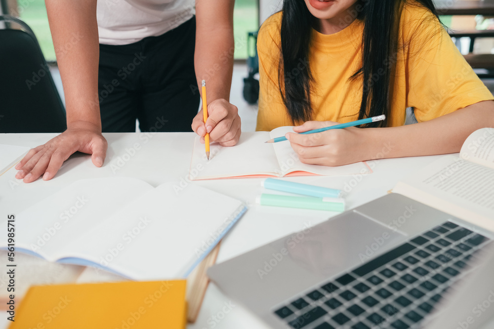 Young Asian students read together with friends. learn together with friends. Young Asian students read together with friends. learn together with friends.