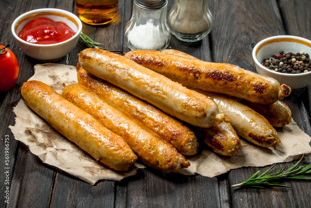 Fragrant grilled sausage with tomato sauce. Fragrant grilled sausage with tomato sauce.