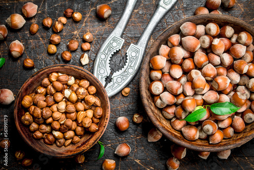 Hazelnuts with Nutcracker on the old Board .