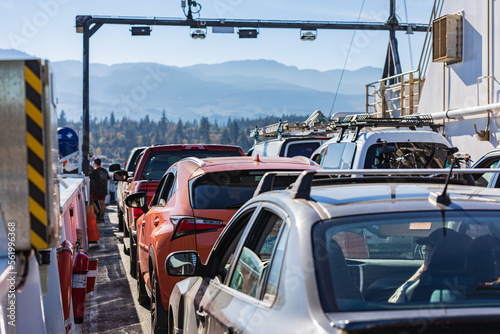 Rows of parked cars on a ferry ship. Cars parked on a ferry Britsh Columba, Canada photo