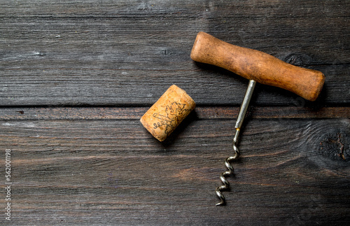 Corkscrew with cork.