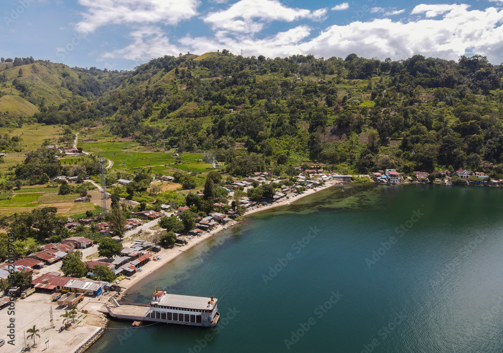 Beautiful view of Toba Lake, a popular tourist destination in North Sumatra, Indonesia. Lake Toba is a large natural lake located in the caldera of Mount Supervolcano.