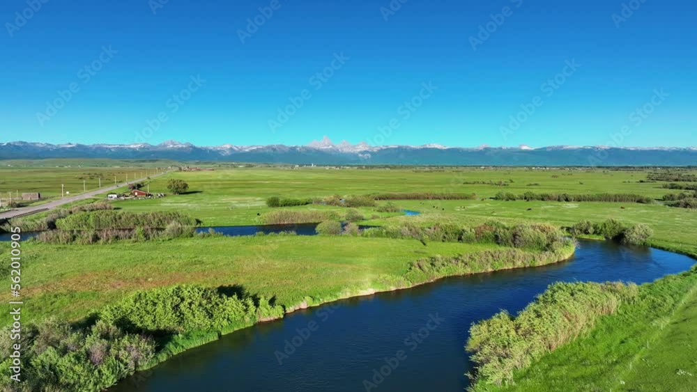 Scenic Green Fields And River In Saint Anthony, Idaho, United States - aerial drone shot Scenic Green Fields And River In Saint Anthony, Idaho, United States - aerial drone shot