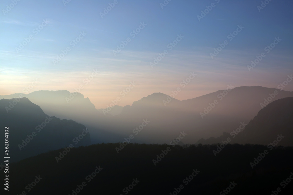 sunset in the mountains with fog sunset in the mountains with fog
