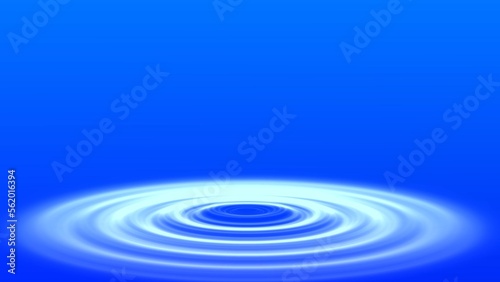 青い背景に光の波紋