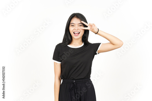 Showing Peace Sign on Eye Of Beautiful Asian Woman Isolated On White Background © Sino Images Studio