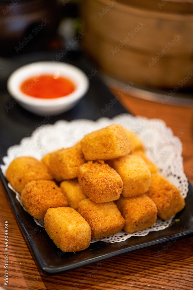 A plate of golden fried tofu