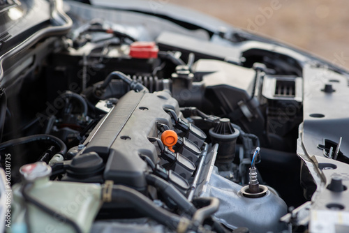 The environmentally friendly motor of a modern car is under the bonnet close-up.