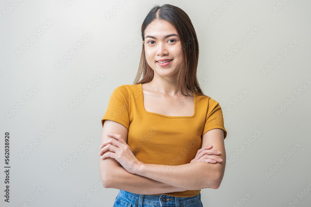 Confident positive, successful smile asian young woman standing crossed arm in casual, portrait brunette girl feel happy, looking at camera. Beautiful businesswoman isolated on background, copy space. Confident positive, successful smile asian young woman standing crossed arm in casual, portrait brunette girl feel happy, looking at camera. Beautiful businesswoman isolated on background, copy space.