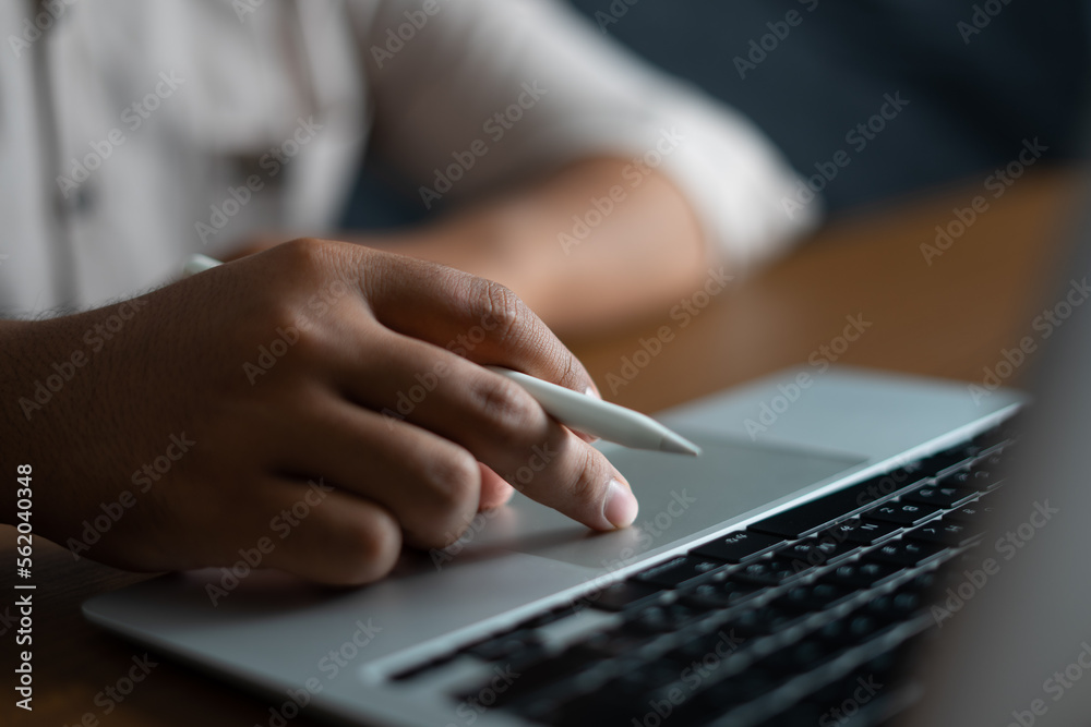 Hand scrolling touch pad while holding a digital pen