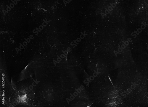 Fototapeta Naklejka Na Ścianę i Meble -  Distressed film texture. Dust scratches overlay. Old creased paper. Dark black white grain uneven crumpled worn grunge abstract copy space background.