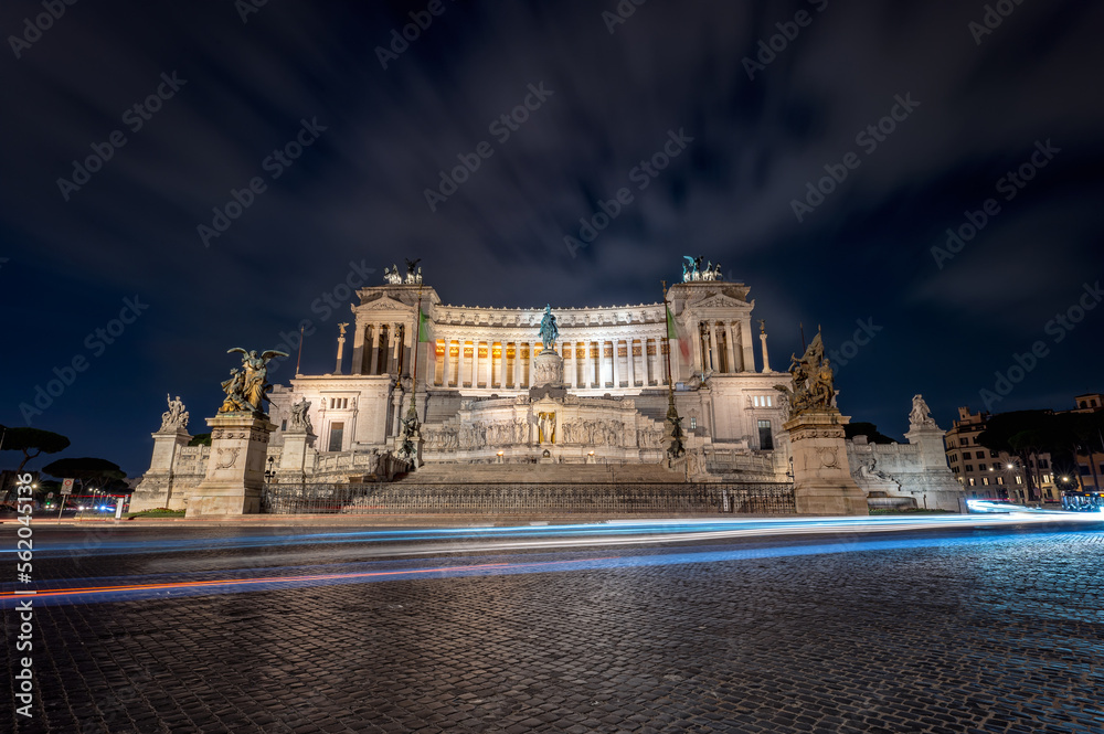 A beautiful view of the illuminated building of Victor Emmanuel II National Monument in Rome at night