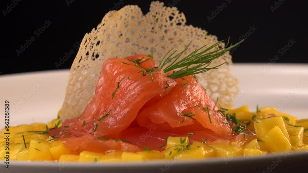 Recipe for salmon gravlax with mango brumoise and white balsamic vinegar dressing. High quality 4k video Recipe for salmon gravlax with mango brumoise and white balsamic vinegar dressing. High quality 4k video