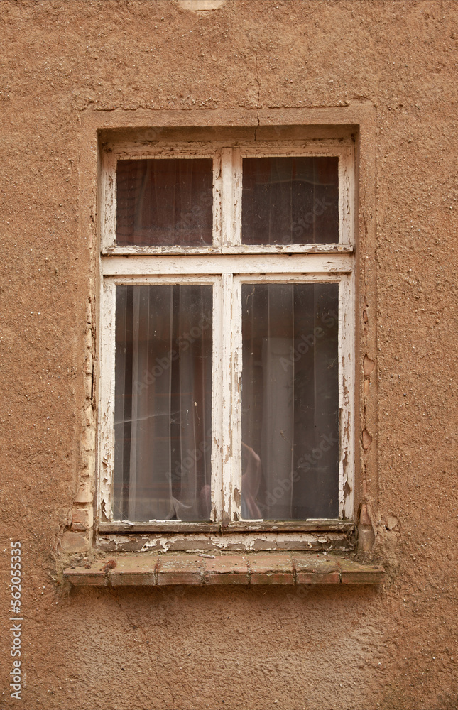 Windows in old houses, wooden. frames and shutters on the windows in the village.
