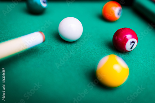 Billiard snooker balls composition on the green pool table. Gambling game of Billiards.