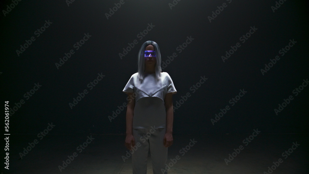 Fototapeta premium Portait cyber girl augmented reality glasses. Beautiful futuristic woman wearing