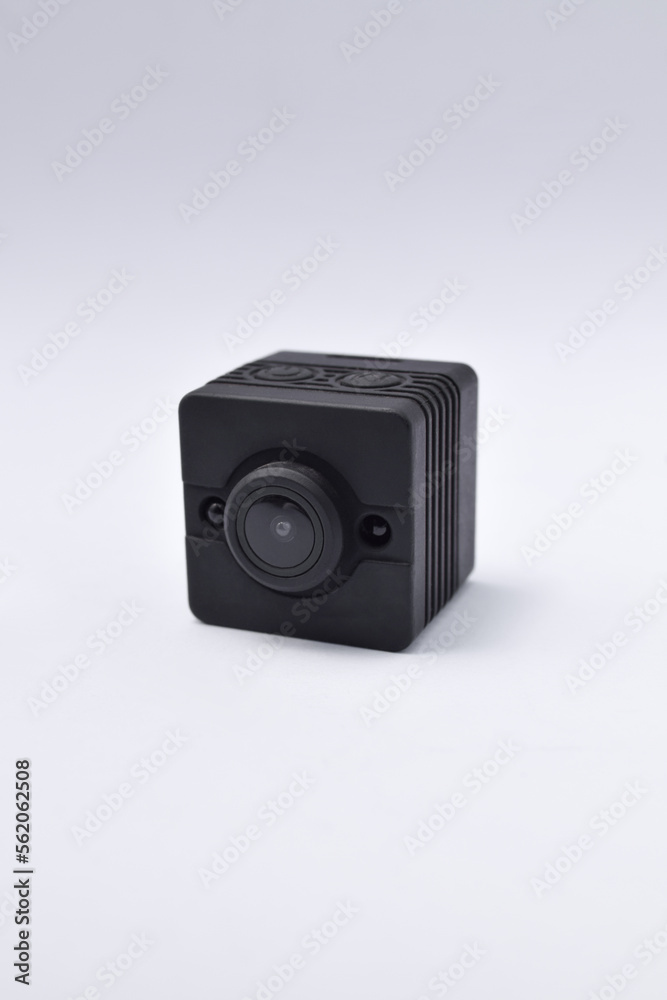 Black security camera isolated on white background. Mini spy camera Black security camera isolated on white background. Mini spy camera