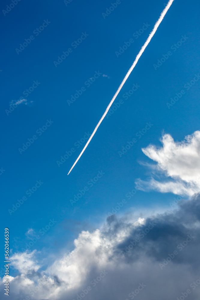 A Vapour trail in the winter sunshine A Vapour trail in the winter sunshine