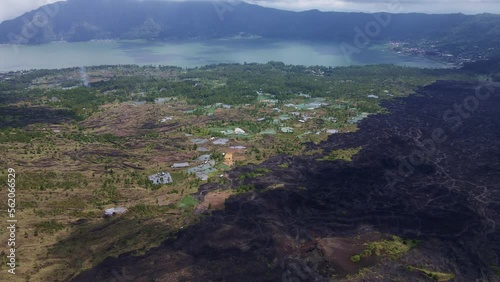 Aerial View Of Cultivated Lands Near Batur Lake With Ganung Batur Volcano At Background In Bali, Indonesia. photo