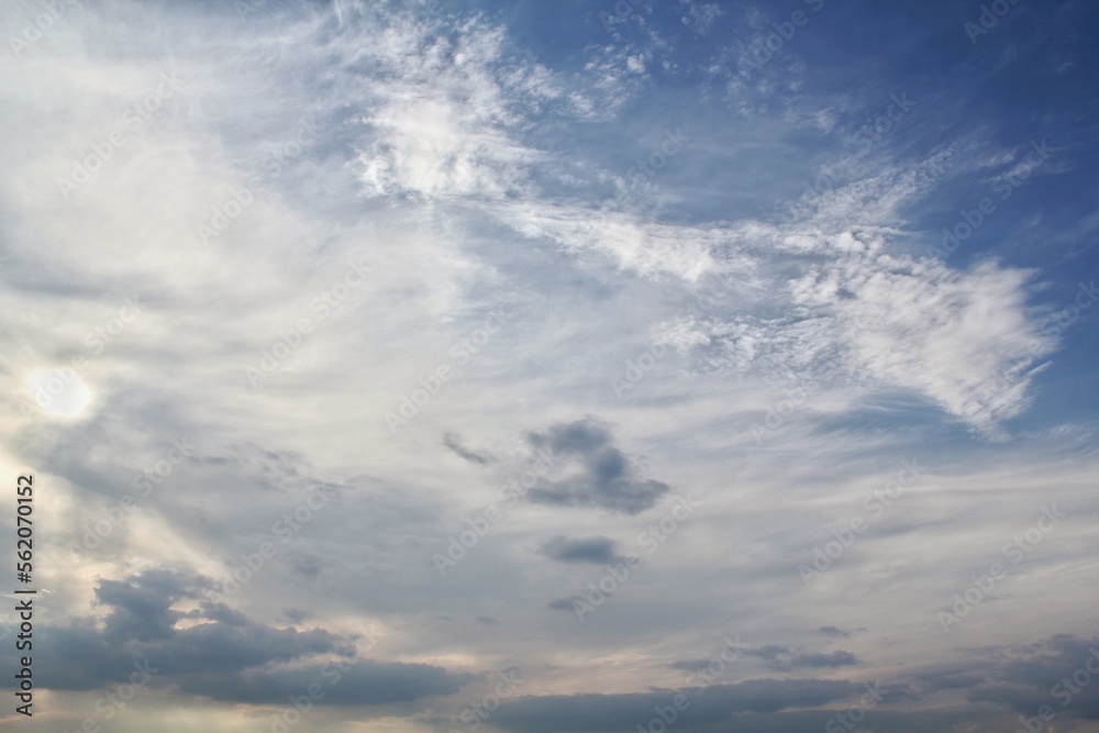 White light soft clouds floating in blue sky. Nature morning landscape background. Clear spring wind. Bright summer day. Winter calm air skyscape. Abstract panorama. Change climate. Low angle view