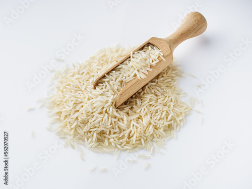 raw basmati rice on a white acrylic background
