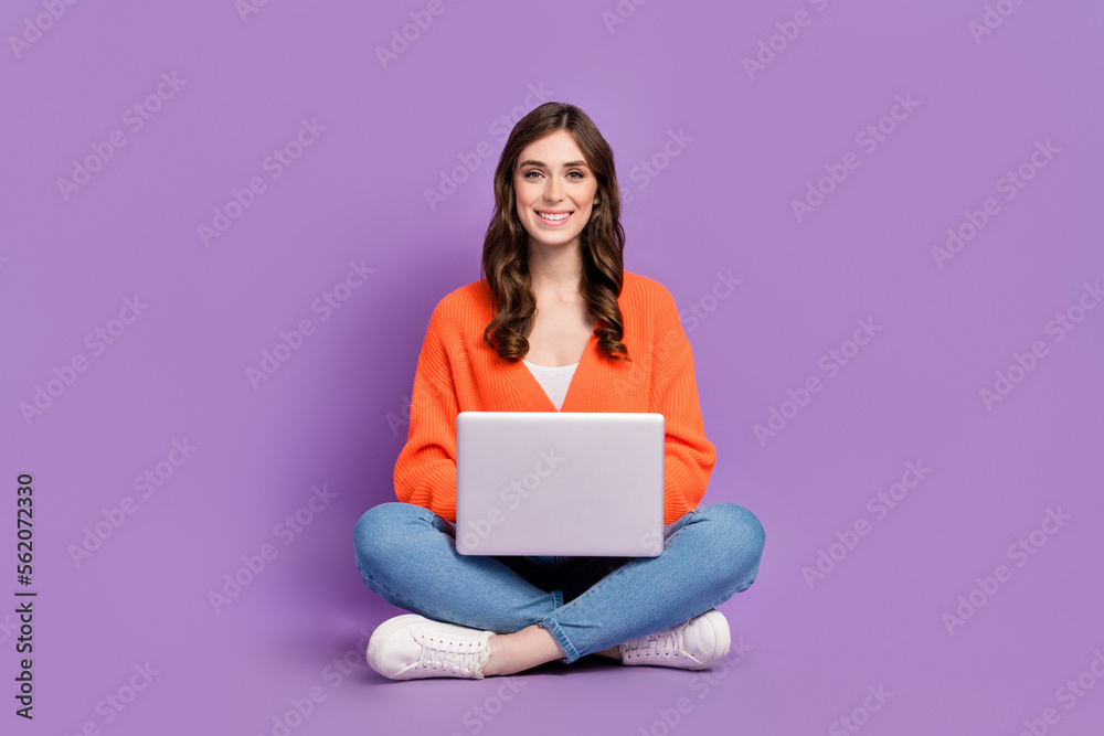Full length photo of positive sweet woman dressed cardigan chatting instagram twitter facebook isolated purple color background Full length photo of positive sweet woman dressed cardigan chatting instagram twitter facebook isolated purple color background