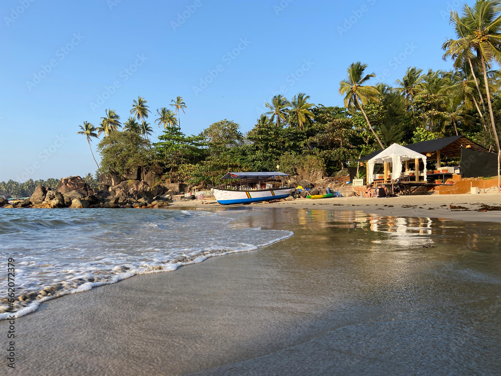 Bright sunny day on Palolem beach South Goa, India.