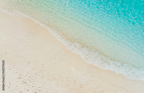 Fototapeta Naklejka Na Ścianę i Meble -  The ecology with Waves on the beach as a background. Beautiful natural background at the summer time-above view