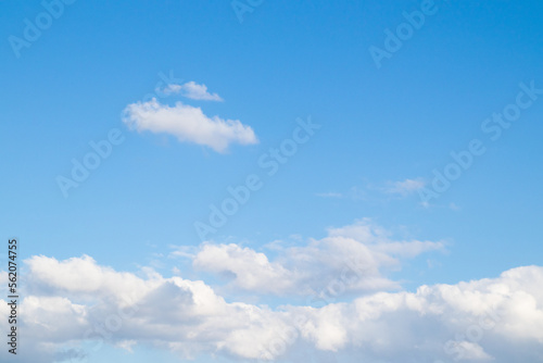 Spring blue sky with white clouds. Spring nature background