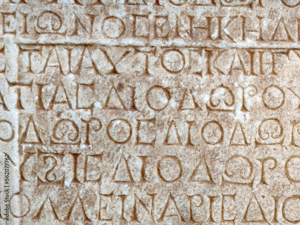 ancient Greek writing on the stone walls of the ancient city of Hierapolis