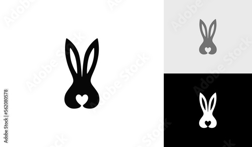 Rabbit head with love symbol logo design vector