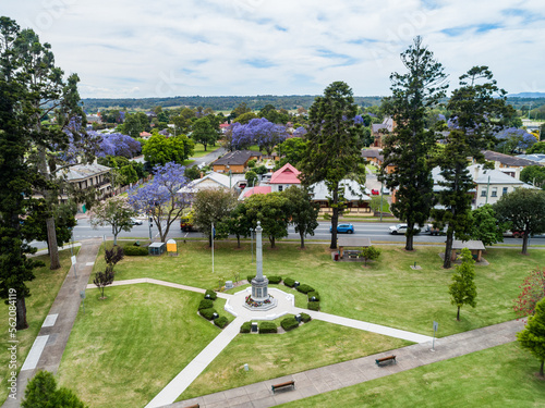 Burdekin Park cenotaph with remembrance day wreaths laid around it seen from aerial view photo