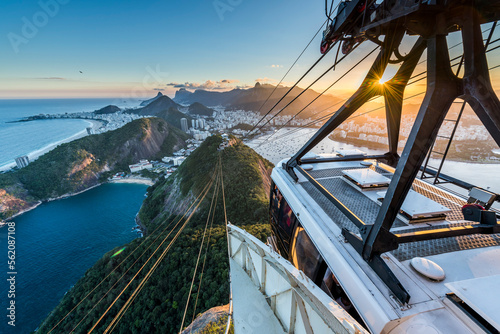 View from the cable car in Sugar Loaf Mountain during sunset in Rio de Janeiro, Brazil photo