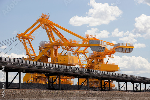 Coal moving machinery at Port Waratah in Newcastle which is the worlds largest coal port. Coal from open cast coal mines in the Hunter Valley is exported around the world from here photo