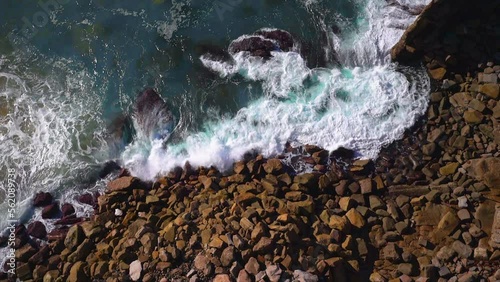 Australia SeaCliff Bridge Surf top down view calming waves crashing rocks by Taylor Brant Film photo