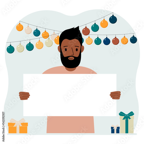 Holiday concept with garland, gift boxes and poster. A man smiles, rejoices and celebrates a birthday, a festive event, a victory, an achievement or a holiday.