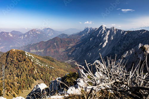 View from Loibler Baba along the Koschutta massive towards Hochobir in the east on a beautiful autumn day. photo