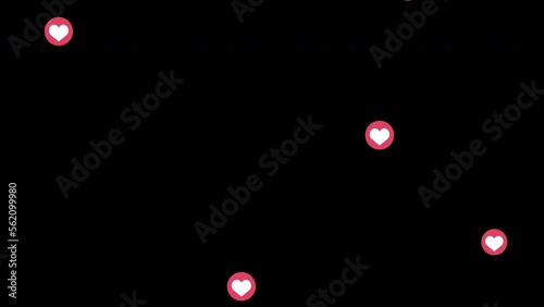 Heart symbol in a red circle falling from top to bottom on a bkack background. Animation overlay for social networks. Like sign. photo