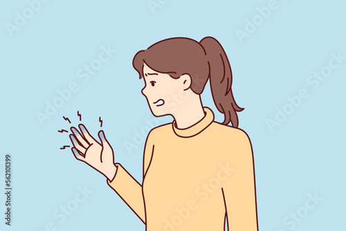 Depressed woman experiencing with blue fingers after injury or chronic illness tormented by pain. Unhappy girl who pinched hand needs help of doctor or healing ointment. Flat vector illustration