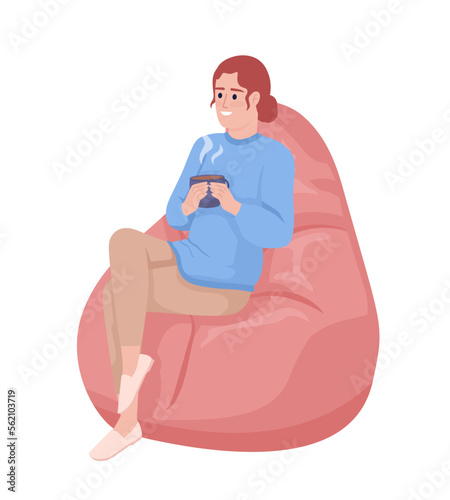 Woman with mug sitting on bean bag semi flat color vector character. Break time. Editable figure. Full body person on white. Simple cartoon style illustration for web graphic design and animation