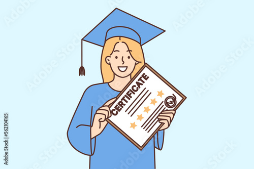 Smiling woman hold graduation diploma in hands 