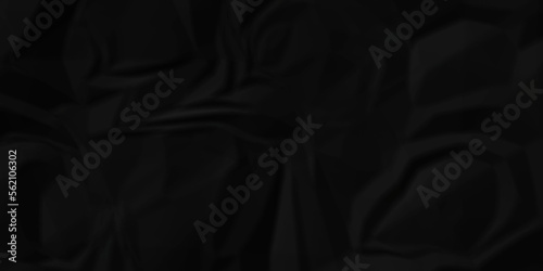 Dark Black facbric paper backdrop crumpled texture. dark black textured crumpled black paper background. panorama black paper texture background, crumpled pattern.