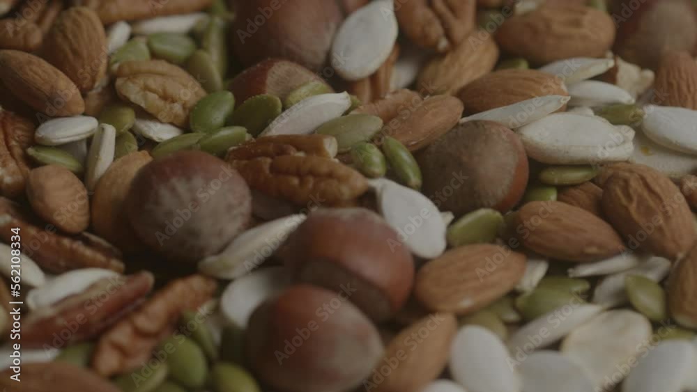 Colorful fresh peanuts on a spinning platter Colorful fresh peanuts on a spinning platter