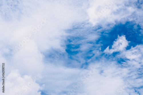 White fluffy clouds on beautiful clearly deep blue sky in a sunny day