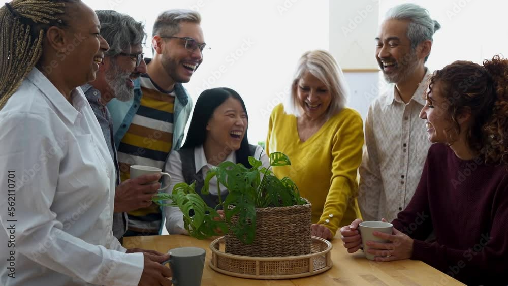 Multi generational people having fun inside kitchen at home while hugging each other - Multiethnic friends enjoy day together indoor
Multi generational people having fun inside kitchen at home while hugging each other - Multiethnic friends enjoy day together indoor