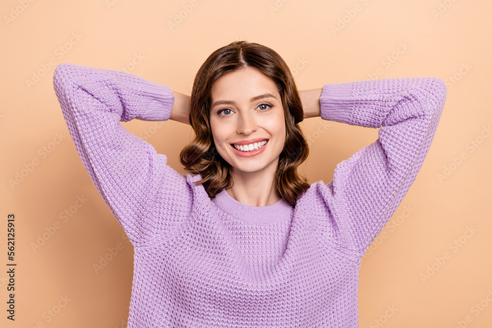 Photo of cheerful nice lady wear violet clothes hold arms behind head want dream weekend trip after work isolated on beige color background Photo of cheerful nice lady wear violet clothes hold arms behind head want dream weekend trip after work isolated on beige color background
