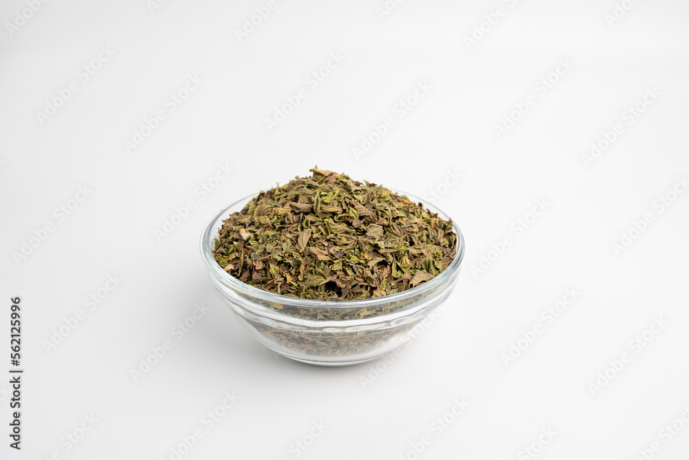 Mentha , mint leaf and dray in a glass dish on a white background