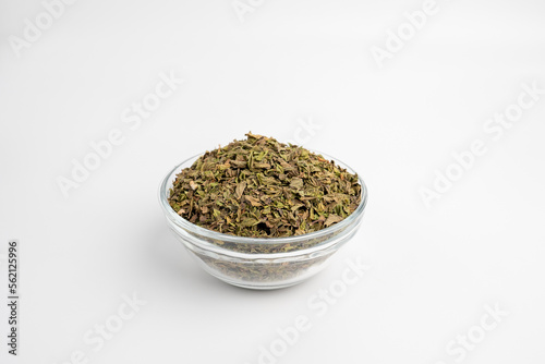 Mentha , mint leaf and dray in a glass dish on a white background